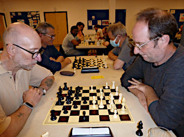 Roy Hughes of Broadland club and Paul Smith do battle in the John Scott blitz in July 2022